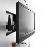 Как да оправяте телевизора на стената на гипсокартонени плоскости и инсталационни функции