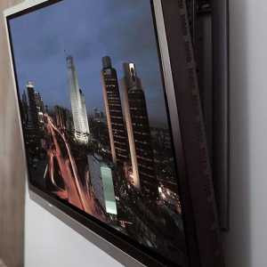 Конзолата за телевизор на стената помага при избора